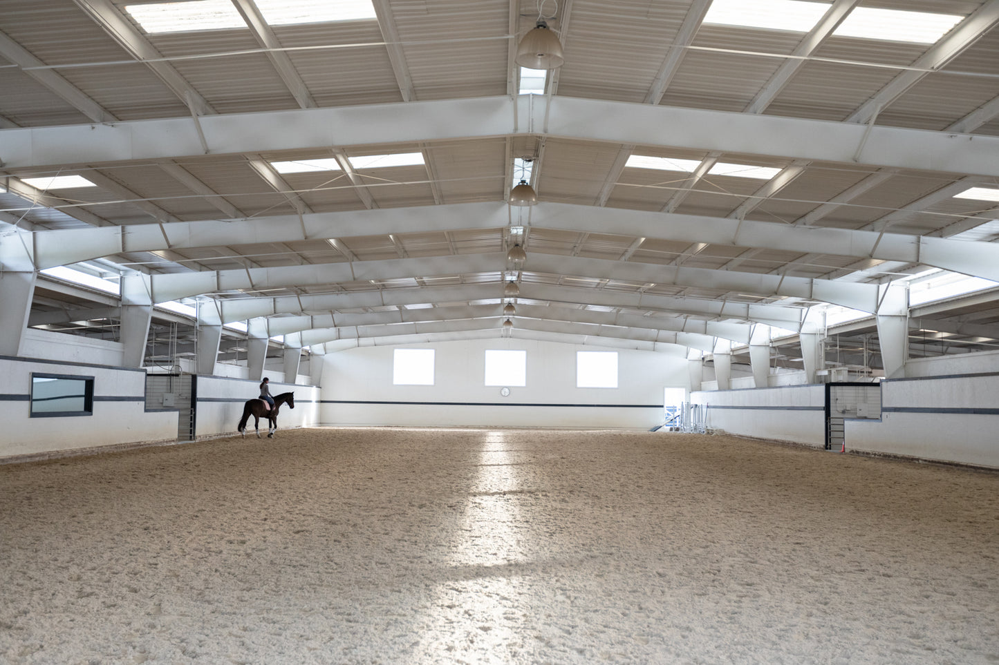 Bay Area indoor riding arena with Olympic Footing